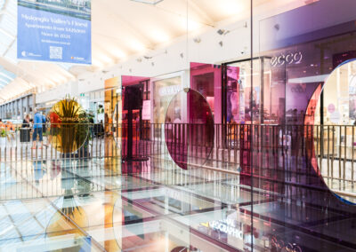 Colourful sheet glass installation in the centre of Canberra Centre mall